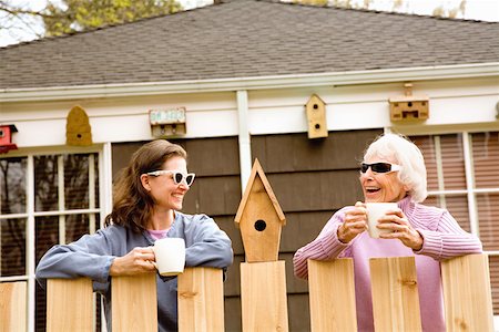 sunglasses for 60 years old women - Mother drinking coffee with grown daughter Stock Photo - Premium Royalty-Free, Code: 673-02141068