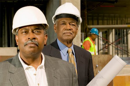 Close up portrait of businessmen at construction site Foto de stock - Sin royalties Premium, Código: 673-02141105