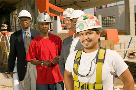 Group portrait of men at construction site Stock Photo - Premium Royalty-Free, Code: 673-02141112