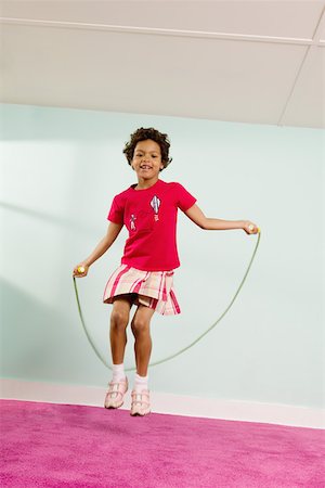 skipping ropes - Portrait of young girl jumping rope Stock Photo - Premium Royalty-Free, Code: 673-02141144