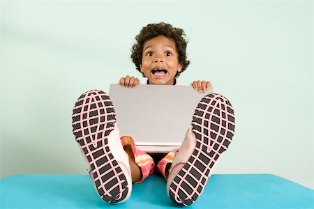simsearch:673-02141032,k - Young girl with laptop Stock Photo - Premium Royalty-Free, Code: 673-02141151