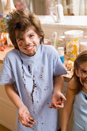 Portrait of boy with food on face Stock Photo - Premium Royalty-Free, Code: 673-02141224