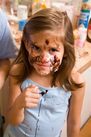 Portrait of girl with food on face Stock Photo - Premium Royalty-Free, Code: 673-02141223