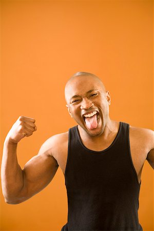 Portrait of man sticking tongue out Stock Photo - Premium Royalty-Free, Code: 673-02141277