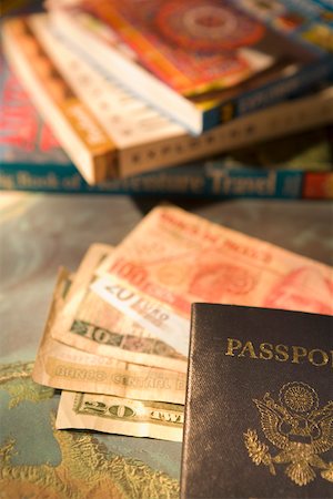 passports and map - Passport with money and books Stock Photo - Premium Royalty-Free, Code: 673-02141335