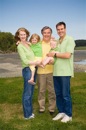 father son portrait old - Group portrait of family smiling Stock Photo - Premium Royalty-Free, Code: 673-02141386