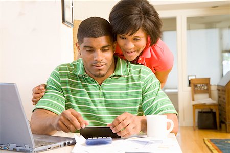 simsearch:673-02143115,k - Couple doing their finances together Stock Photo - Premium Royalty-Free, Code: 673-02141714