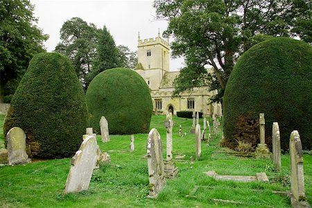 Finely trimmed hedges in graveyard, Cotswolds, United Kingdom Stock Photo - Premium Royalty-Free, Code: 673-02141846