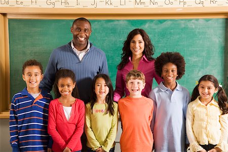 Portrait of teachers and students in classroom Stock Photo - Premium Royalty-Free, Code: 673-02141937