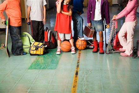 friends basketball - Group of students with sports equipment in hallway Stock Photo - Premium Royalty-Free, Code: 673-02141950