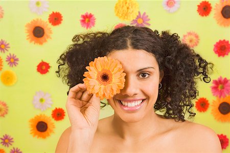 simsearch:673-02142187,k - Woman holding flower over eye Stock Photo - Premium Royalty-Free, Code: 673-02142183