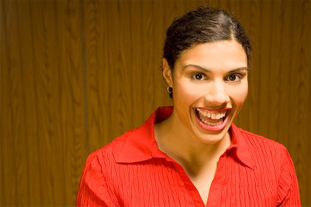 simsearch:673-02142185,k - Close up of woman laughing Fotografie stock - Premium Royalty-Free, Codice: 673-02142216
