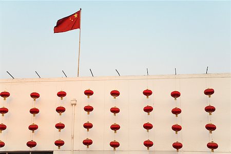 rows of lamps - Lanterns and flag on department store for Chinese Lunar New Year, Beijing, China Stock Photo - Premium Royalty-Free, Code: 673-02142582