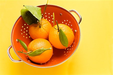 Oranges in colander Stock Photo - Premium Royalty-Free, Code: 673-02142709