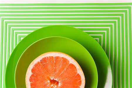 Grapefruit in green bowl Foto de stock - Sin royalties Premium, Código: 673-02142720