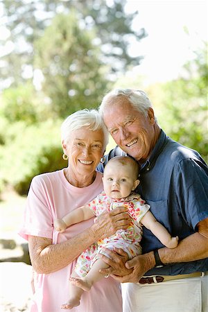 Senior couple holding baby Stock Photo - Premium Royalty-Free, Code: 673-02142894
