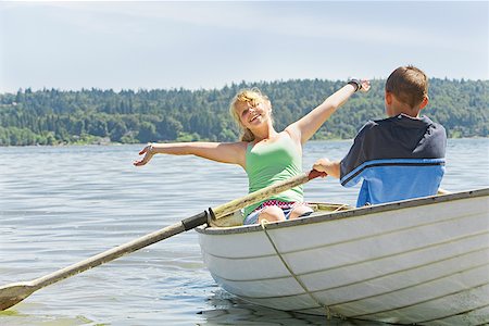 Boy and girl in row boat Foto de stock - Sin royalties Premium, Código: 673-02142953