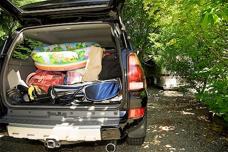 Rear view of truck packed for vacation Stock Photo - Premium Royalty-Free, Code: 673-02143344