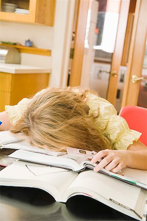 simsearch:673-02143588,k - Teenage girl sleeping on school books Foto de stock - Royalty Free Premium, Número: 673-02143516