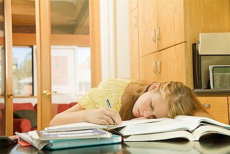 posposición - Teenage girl sleeping on school books Foto de stock - Sin royalties Premium, Código: 673-02143518