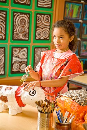 sculpture class children - African girl making art project Stock Photo - Premium Royalty-Free, Code: 673-02143665