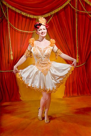 pin up - Woman wearing ornate costume Stock Photo - Premium Royalty-Free, Code: 673-02143753