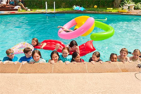portrait of preteen girl in swimming pool - Pool party Stock Photo - Premium Royalty-Free, Code: 673-03005414