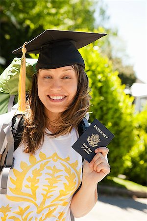 schlau - Young woman with backpack and passport Stock Photo - Premium Royalty-Free, Code: 673-03005549