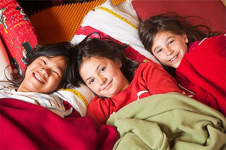 preteen asian girls bed - Children at sleepover Stock Photo - Premium Royalty-Free, Code: 673-03005589