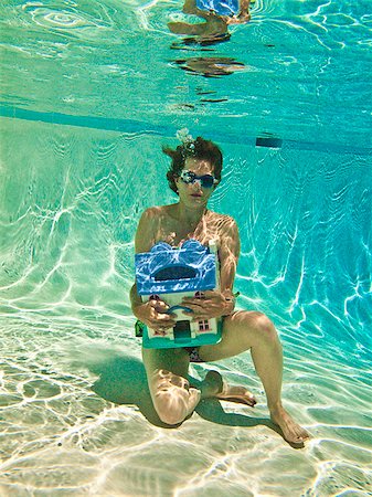 person sinking underwater