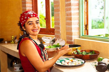 woman preparing food in kitchen Stock Photo - Premium Royalty-Free, Code: 673-03623149