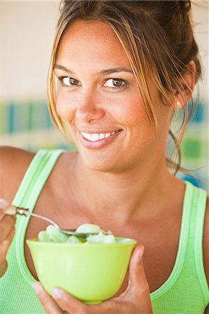 sherbet - woman eating ice cream Stock Photo - Premium Royalty-Free, Code: 673-03623140