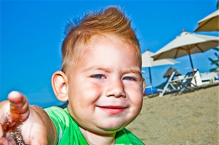 young boy on beach Stock Photo - Premium Royalty-Free, Code: 673-03623242