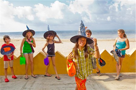 children at beach in witch hats Stock Photo - Premium Royalty-Free, Code: 673-03826274