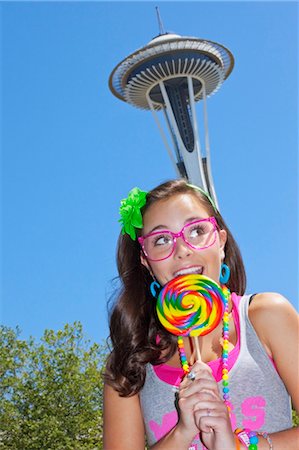 simsearch:640-03262770,k - teen girl with lollipop and space needle Stock Photo - Premium Royalty-Free, Code: 673-03826336