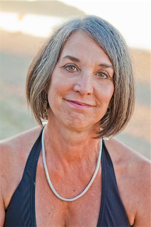 pretty gray hair smiling - portrait of middle aged woman outdoors Stock Photo - Premium Royalty-Free, Code: 673-03826393