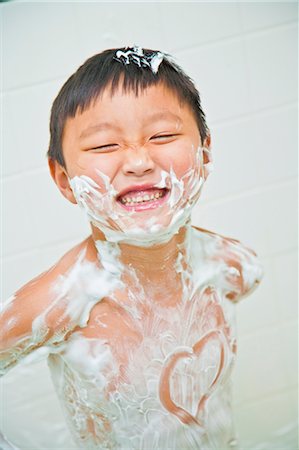 boy covered in shaving cream Stock Photo - Premium Royalty-Free, Code: 673-03826507