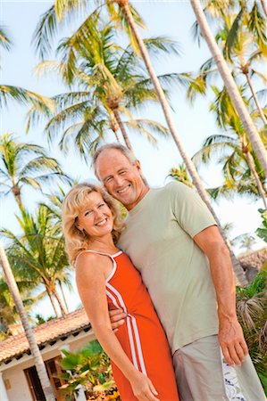 middle aged couple with palm trees Stock Photo - Premium Royalty-Free, Code: 673-03826569