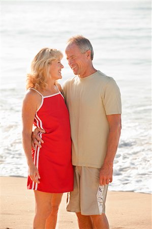 middle aged couple hugging on beach Stock Photo - Premium Royalty-Free, Code: 673-03826579