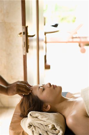simsearch:685-02937230,k - Young woman having head massage Stock Photo - Premium Royalty-Free, Code: 685-02937245