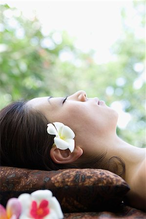 simsearch:685-02937281,k - Close-up of young woman lying down Stock Photo - Premium Royalty-Free, Code: 685-02937264