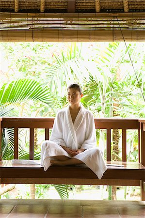 simsearch:685-02937230,k - Young woman sitting on bench Stock Photo - Premium Royalty-Free, Code: 685-02937299