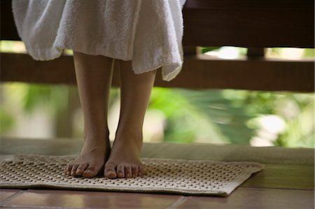 simsearch:685-02937281,k - Feet of young woman on bath mat Stock Photo - Premium Royalty-Free, Code: 685-02937300