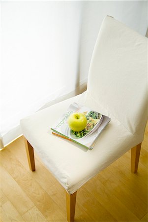 simsearch:685-02937448,k - Apple on chair Stock Photo - Premium Royalty-Free, Code: 685-02937392