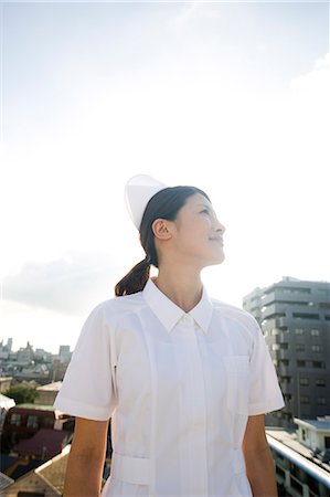 simsearch:685-02938370,k - Portrait of a female nurse Fotografie stock - Premium Royalty-Free, Codice: 685-02938391