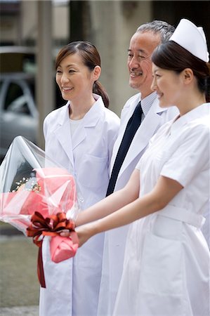 simsearch:685-02941550,k - Doctors and nurse smiling Stock Photo - Premium Royalty-Free, Code: 685-02938403