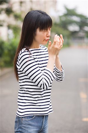 simsearch:685-02938515,k - A woman sneezing Stock Photo - Premium Royalty-Free, Code: 685-02938558