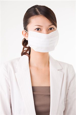 simsearch:685-02938515,k - Young woman wearing mask Stock Photo - Premium Royalty-Free, Code: 685-02938585