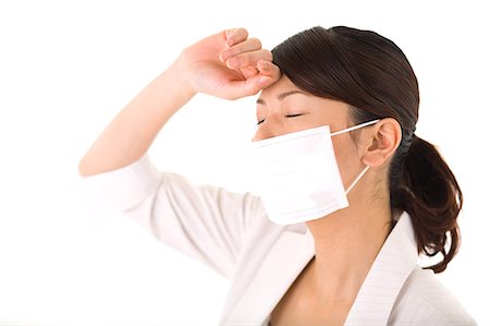 simsearch:685-02938526,k - Young woman wearing mask Stock Photo - Premium Royalty-Free, Code: 685-02938587