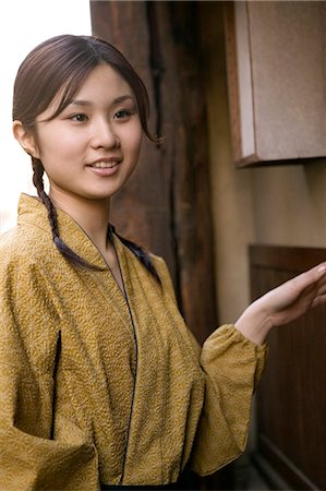 simsearch:685-02938851,k - Portrait of young woman smiling Stock Photo - Premium Royalty-Free, Code: 685-02938892